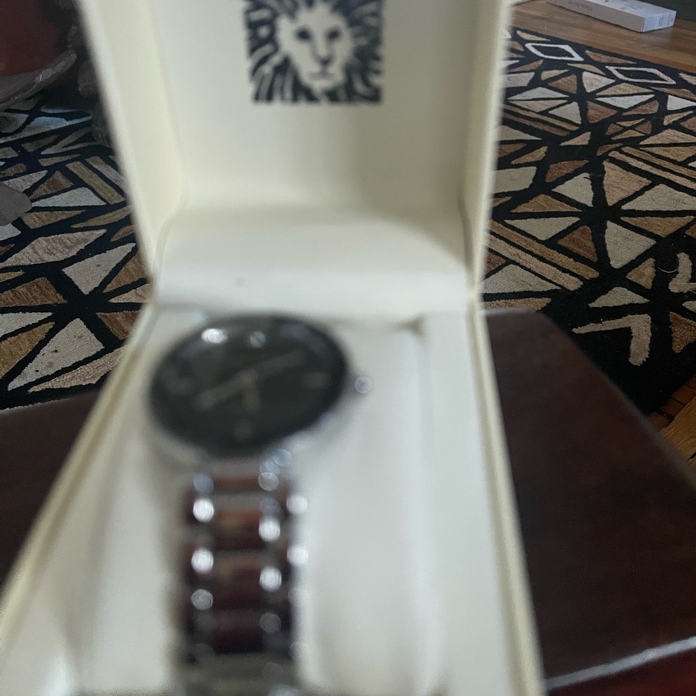 NWOT silver watch, rhinestone with black face and silver hands